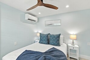 Cozy, stylish bedroom with AC, warm lighting, and modern coastal touches - Full Duplex, Steps to the Beach, King Bed Masters (Holmes Beach)