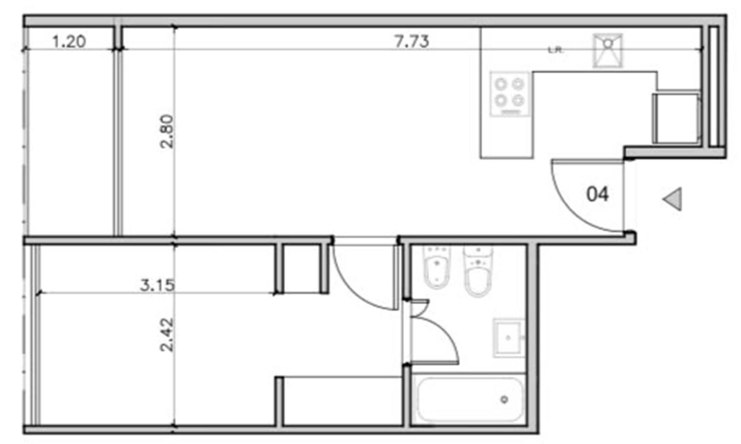 Plano de planta que muestra una cocina, dos baños y una sala de estar.