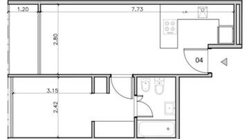Plano de planta que muestra una cocina, dos baños y una sala de estar.