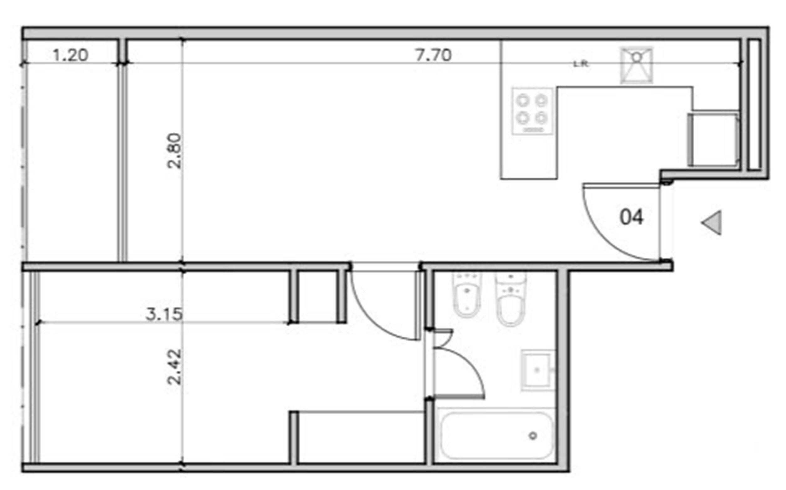 Un plano de planta que muestra una cocina, un baño y una sala de estar.