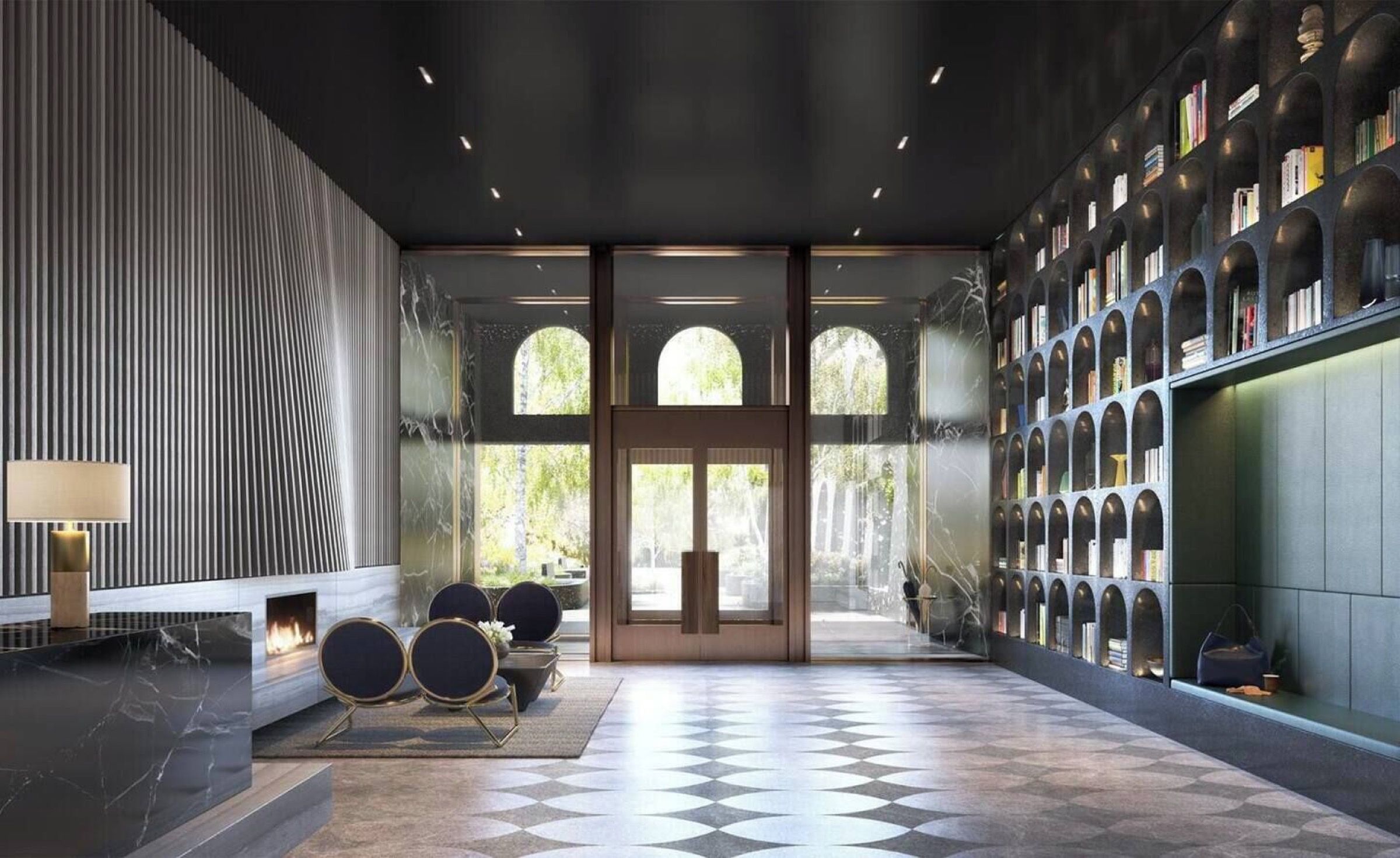A modern lobby with a checkered floor, a fireplace, seating area, and a bookshelf.