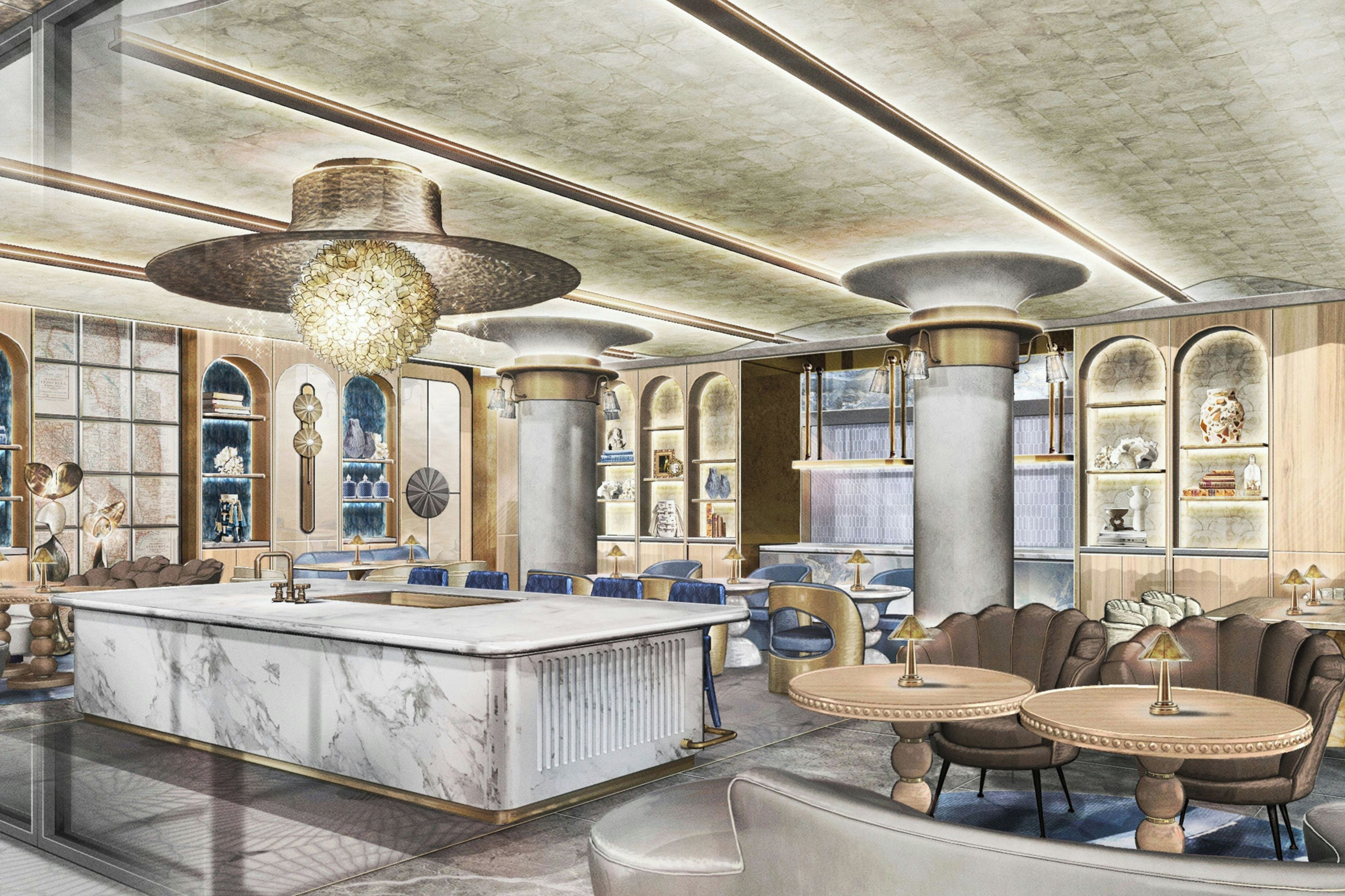 A spacious hotel lobby with a marble reception desk, seating areas, and decorative lighting.