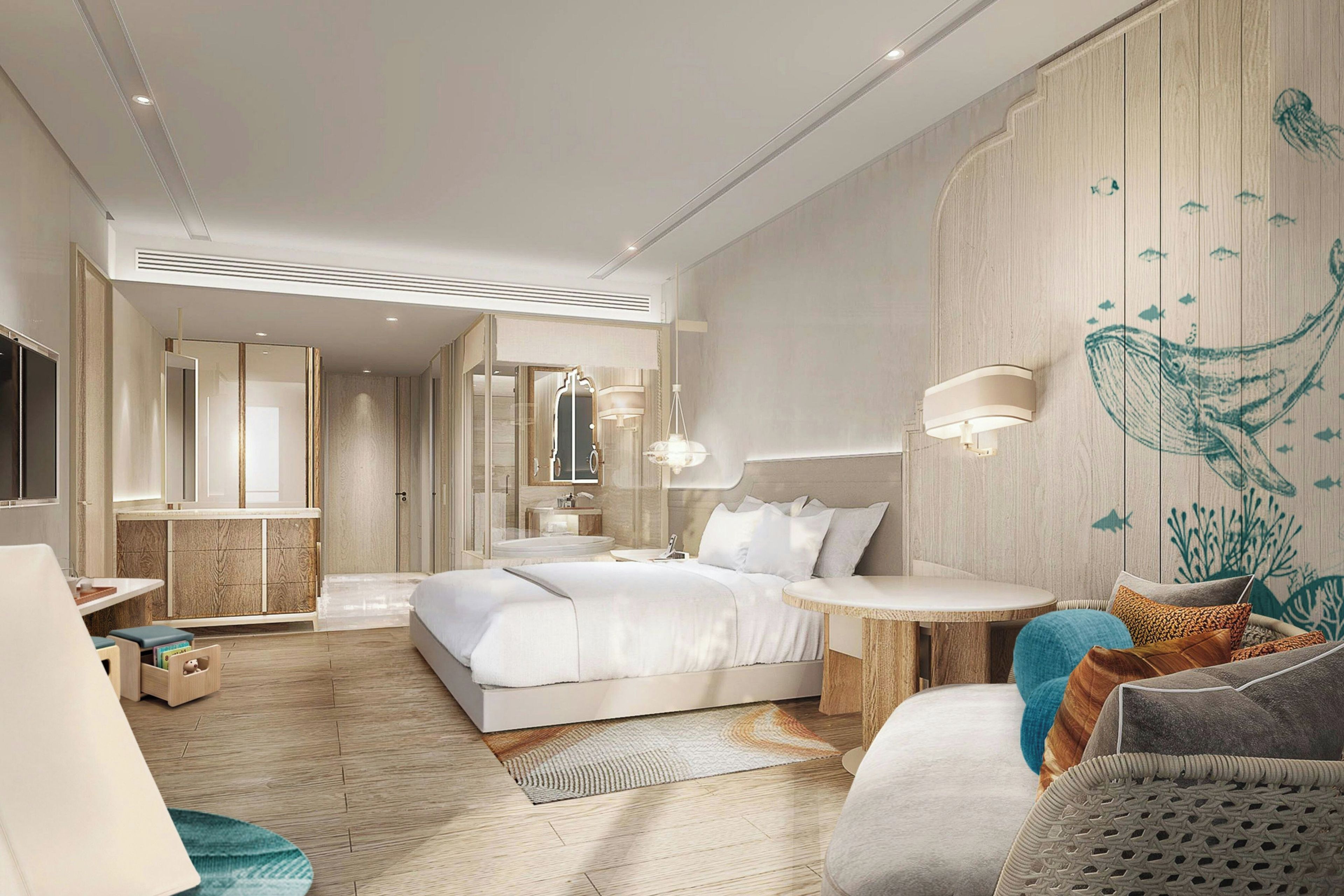 Een moderne slaapkamer met een groot bed, nachtkastjes, een ronde salontafel en een muurschildering.