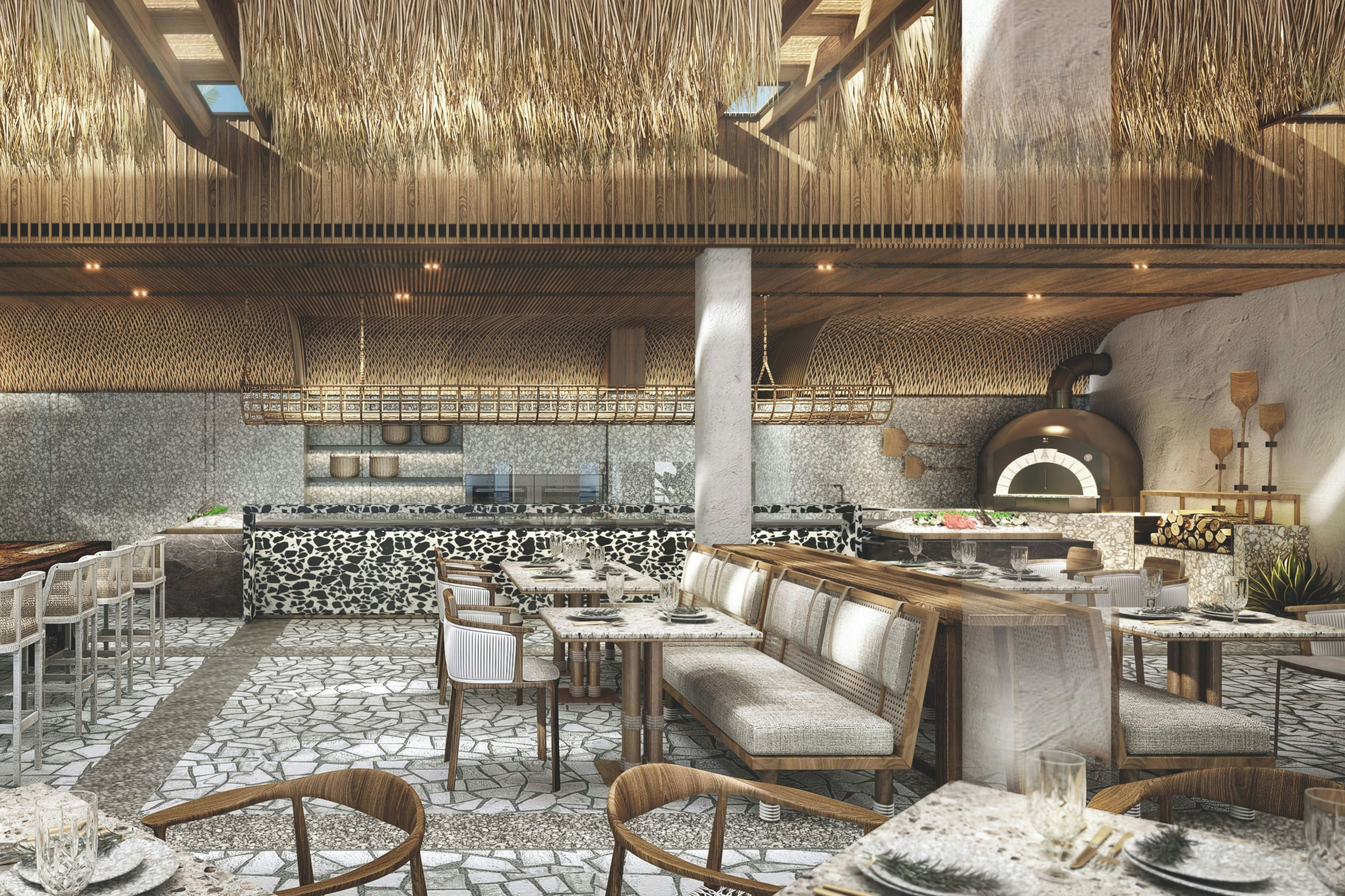 A spacious outdoor dining area with stone flooring, wooden furniture, and a central bar area.