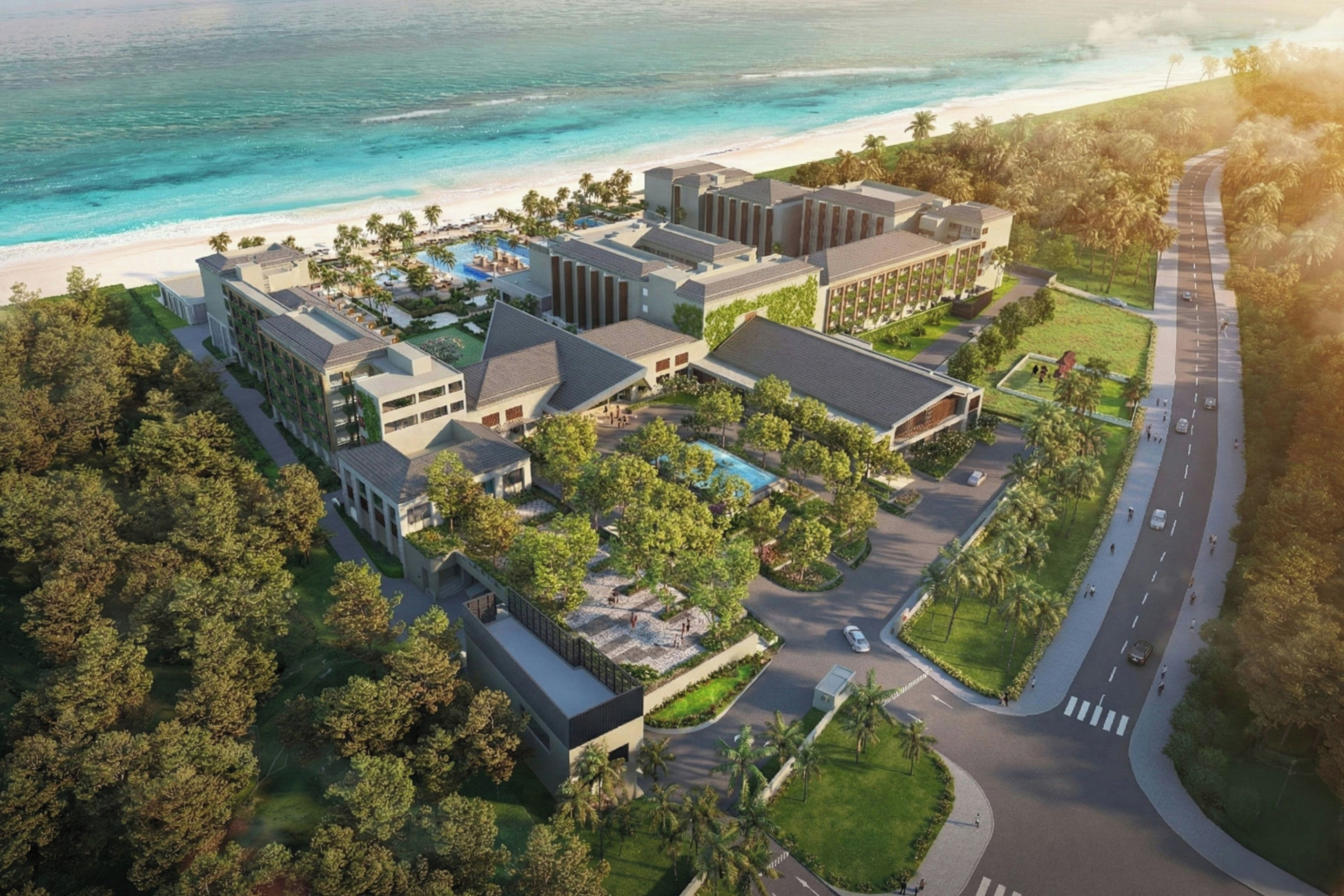 A resort with multiple buildings, a swimming pool, and a beach.