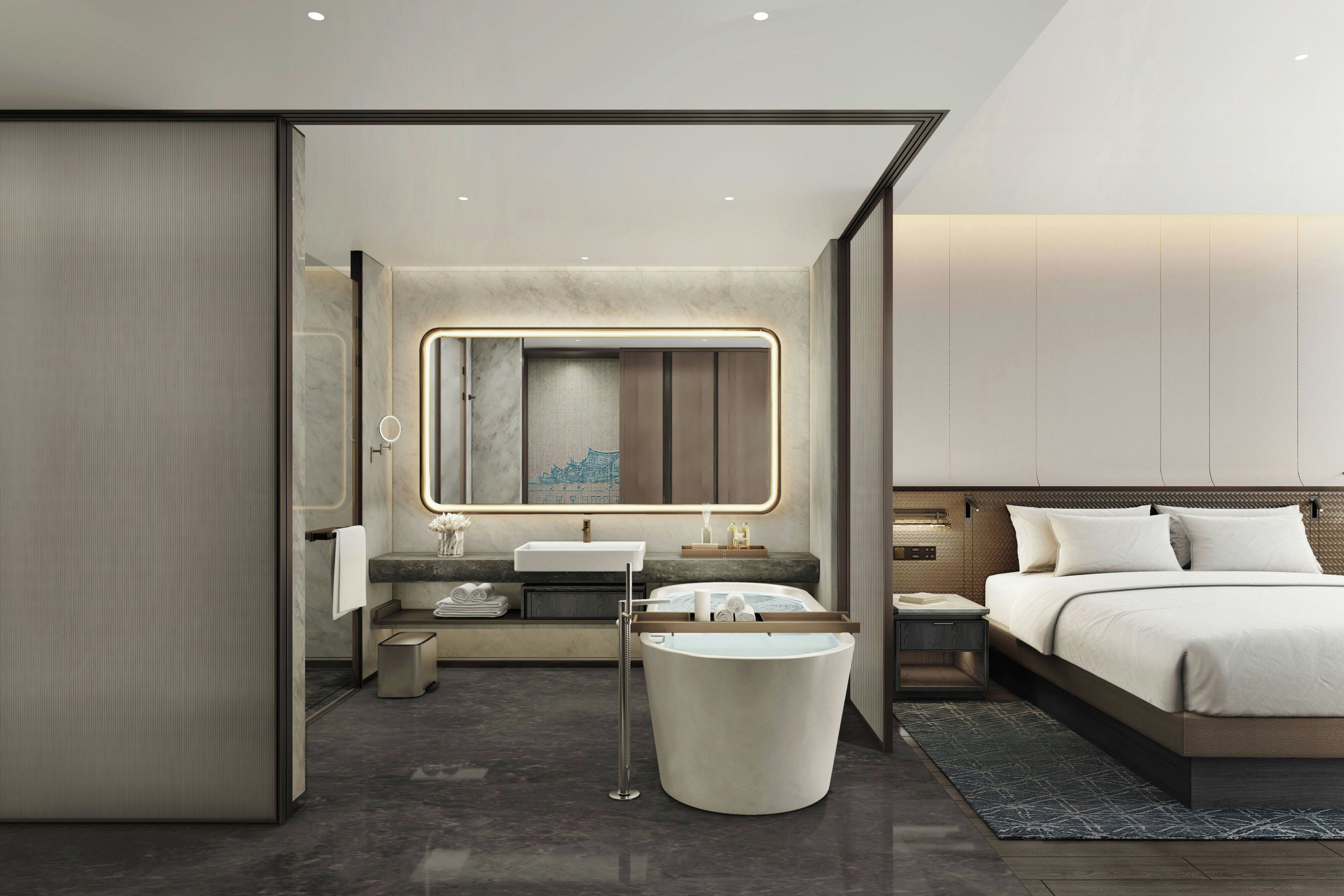 A modern bedroom with a large bed, a built-in bathtub, and a large mirror.