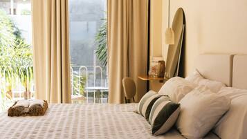 Deluxe Suite, Balcony, Pool View | In-room safe, desk, iron/ironing board (on request), WiFi (free)