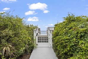 A gated entrance to a property with a clear sky above. - No crowds!!!! Private deeded beach…South side of 30a! No streets to cross!! BIG! (Santa Rosa Beach)