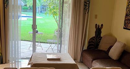 Casa Corazon: a tropical boutique villa by the golf course, with a pool and a nearby beach