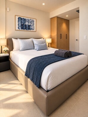A modern bedroom with a large bed, bedside lamps, a wooden wardrobe, and a framed artwork on the wall. - Modern Miami 2BR Suite | Sleeps 4 | Pool & Gym (Miami)