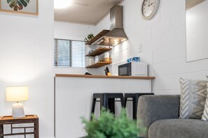 Kitchen  - Bright 2-Bed Apartment Near Cairns Esplanade (Cairns North)