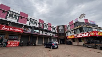 A hotel with multiple rooms and a restaurant.