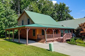 A wooden house with a green roof and a porch. - 5 Mi to Cataloochee Ski! Mtn-View Retreat w/ Deck (Maggie Valley)