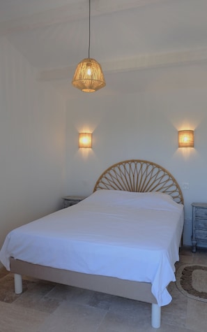 A bedroom with a bed, two wall-mounted lamps, and a hanging light fixture. - Maison Olivette: Provençal villa with a private pool, 6 bedrooms, and olive trees (Flayosc)