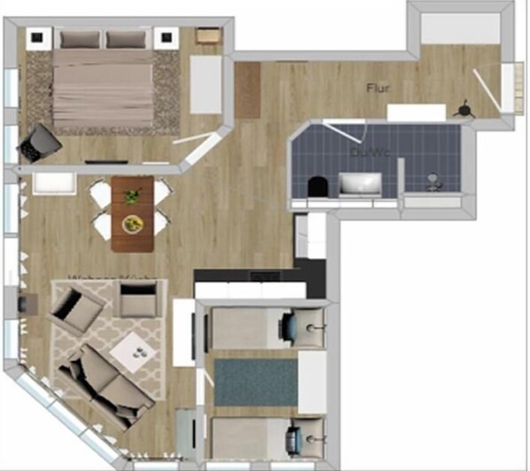 Een hotelkamerindeling met een bed, zithoek en een kleine kitchenette.