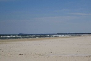 A beach with a clear sky and calm sea. - Seeperle Karlshagen with whirlpool (Karlshagen)
