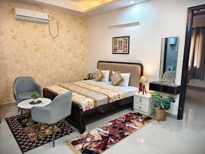 Unclassified image, 5 of 56, button - hotel roomin (Noida)