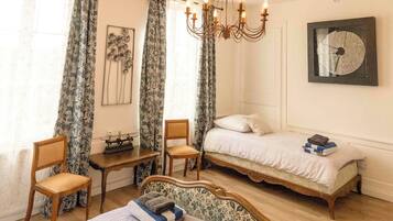 Iron/ironing board, travel crib, WiFi (free), bed sheets