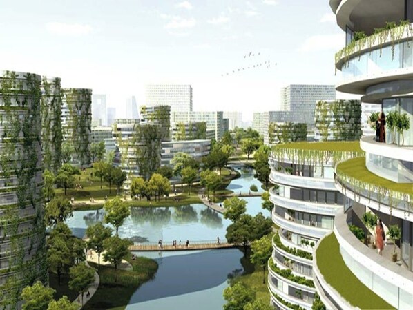 A modern building with multiple balconies, a central water feature, and surrounding greenery. - Vienna 3 Best Hotel (Tianjin)