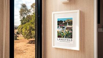 A framed picture of Lancefield in the Macedon Ranges on a wall.
