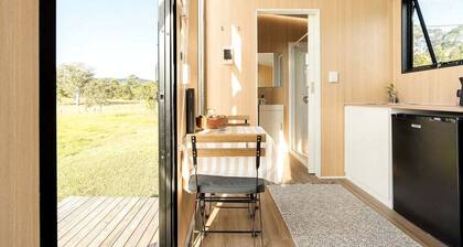 Serene Tiny Home Retreat with Farm Views, Near Noosa Heads in Tuchekoi, Queensland