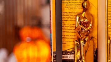 A book with a golden statue on its cover.