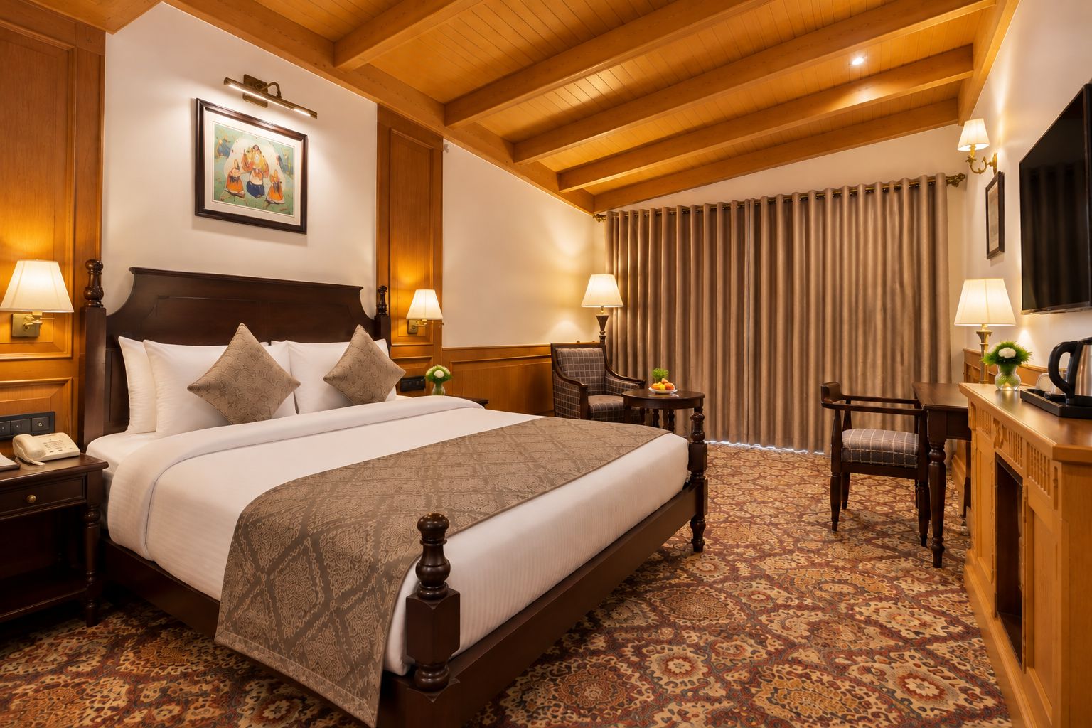 A hotel room with a large bed, a desk, a chair, a television, and a painting on the wall.