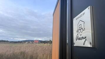 A door with a sign indicating management by Tiny Away.