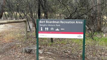 A sign for Bert Boardman Recreation Area at Steiglitz Historic Park, indicating facilities like picnic areas and BBQ.