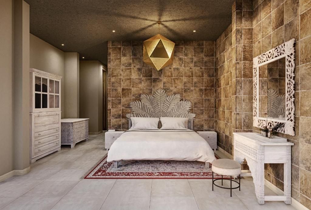 Un dormitorio con una cama grande, un cabecero decorativo, un aparador blanco y un espejo.