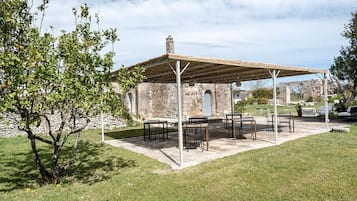 Deluxe Triple Room, Garden View | Outdoor dining