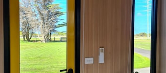 Cozy Tiny House with Firepit and Scenic Ocean Views in Portland, Australia