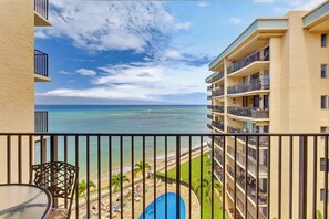 A balcony with a view of a beach and ocean. - New Luxury Retreat  Vast Ocean Views & Huge Lanai (Lahaina)