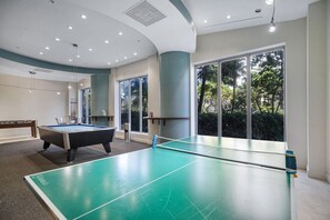 A billiards room with a pool table, a snooker table, and a table tennis table. - Beachfront Nirvana | Corner View • Pool • Gym (Hollywood)