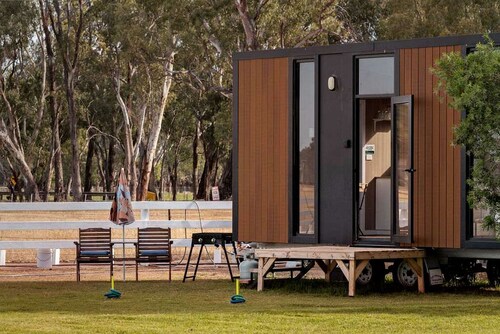 Tiny House Stay with Cozy Fireplace and Nature Views in Koonoomoo, Australia