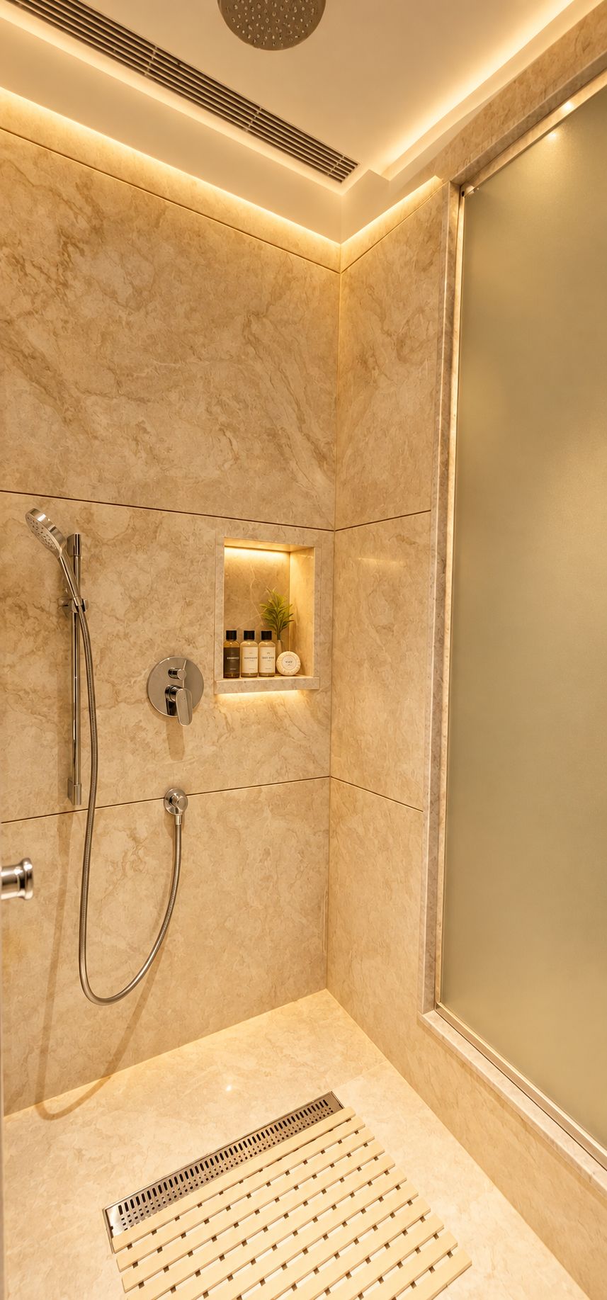 A modern bathroom with a shower, a vanity with a mirror, and a shelf with toiletries.