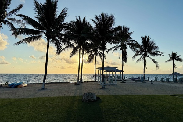 Soak up tropical serenity as the sun melts into sea.