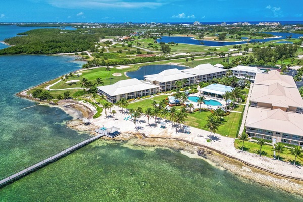 Explore the stunning coastline and nearby greens from above.