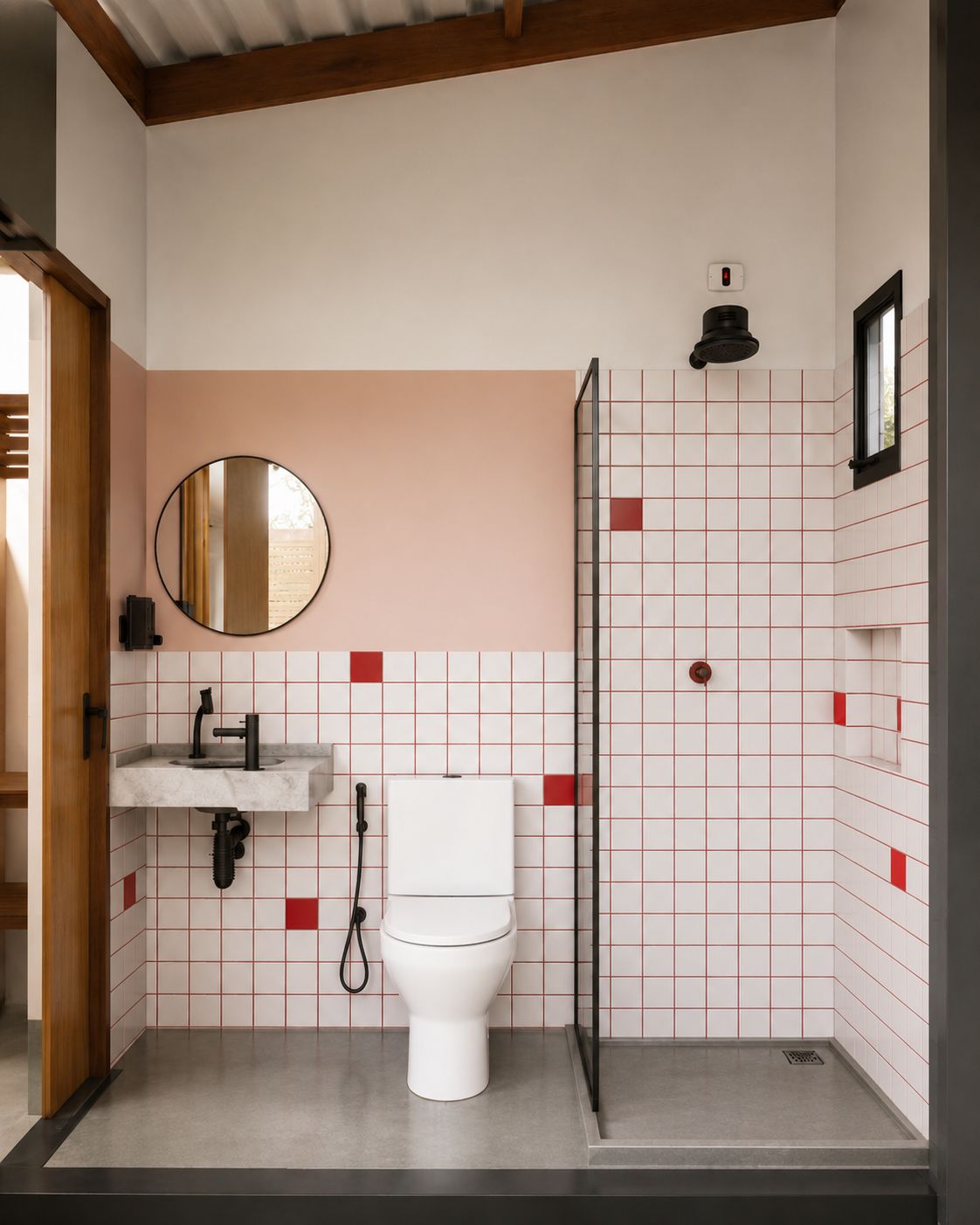 Ein kleines Badezimmer mit Toilette, Waschbecken und Dusche.