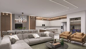 A modern living room with a sofa, armchairs, and a coffee table. - Brand New Disney Themed 10BR Home Windsor Cay Res (Clermont)