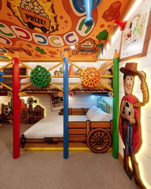 A themed children's room with a bunk bed, a sheriff's office, and a cowboy figure. - Brand New Disney Themed 10BR Home Windsor Cay Res (Clermont)