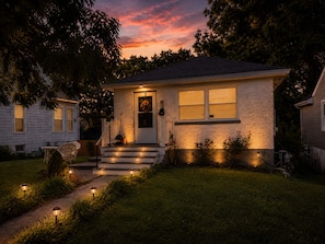 A residential house with a front porch, steps, and a door. - Georgetown Cozy Duo - Entire Duplex (Georgetown)