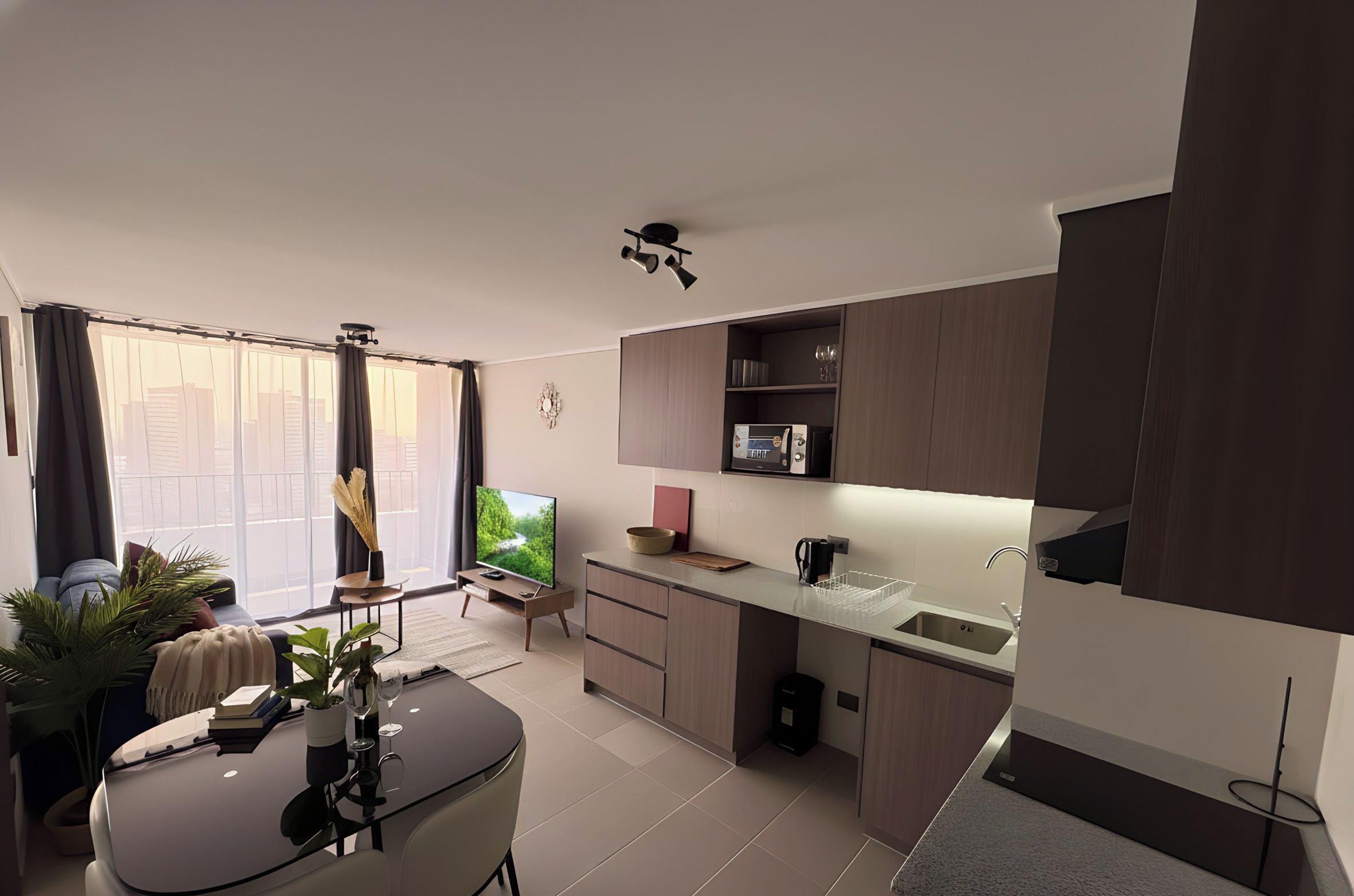 Un apartamento moderno con sala de estar, comedor y cocina.