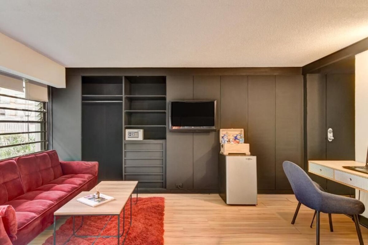 Habitación Deluxe con 2 camas individuales | Área de sala de estar