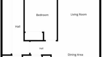 Een plattegrond met een hoofdslaapkamer, balkon, woonkamer, eethoek, keuken, twee gangen en twee badkamers.