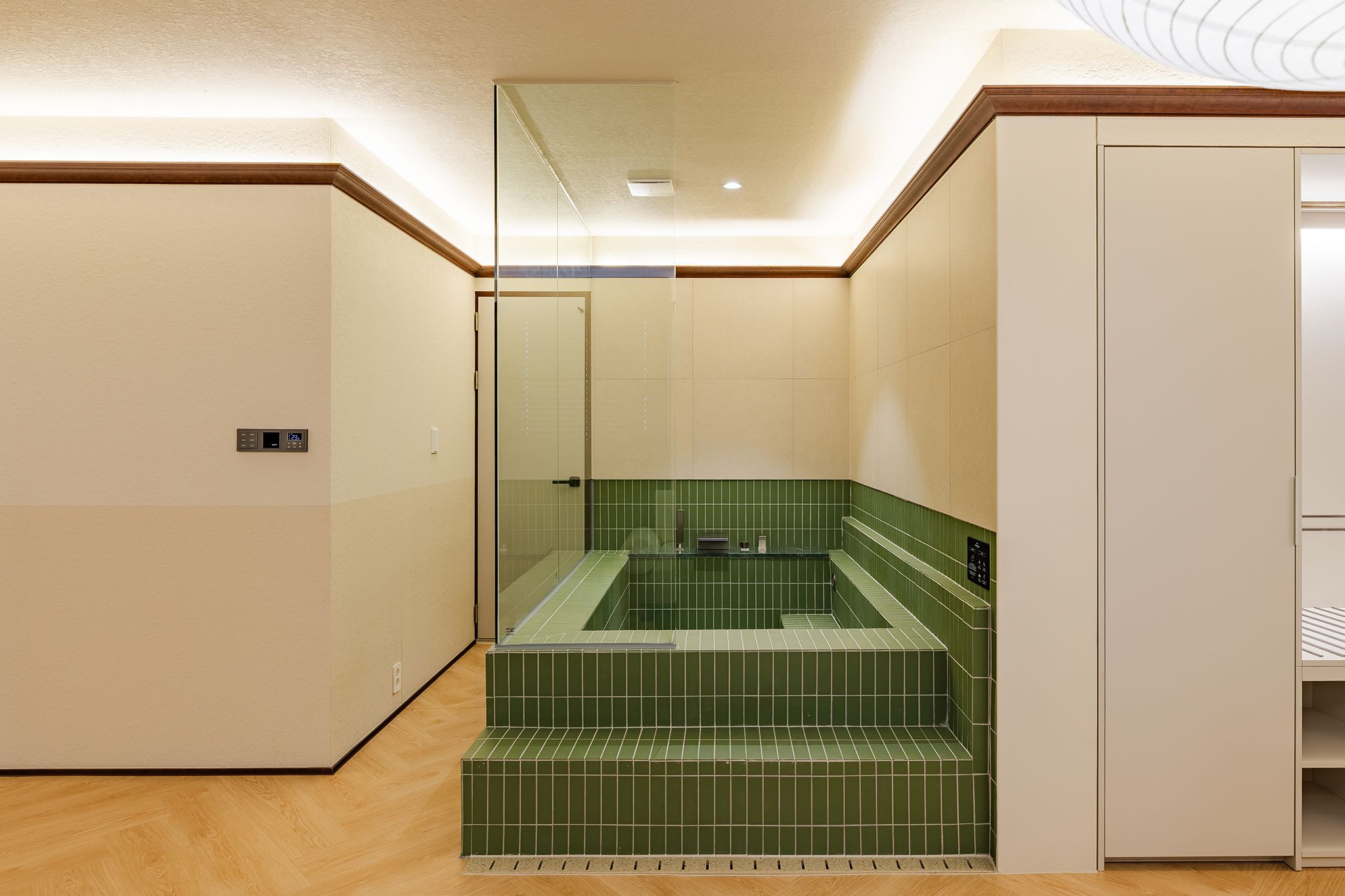 A bathroom with a bathtub, a shower, and a toilet.