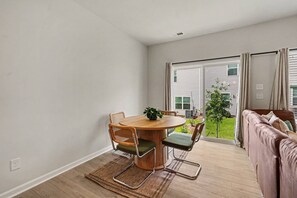 Enjoy your morning coffee overlooking the yard! - Location, Location, Location | Newly Built Townhome with Garage | Enjoy A Cozy & Peaceful Stay! (Charlotte)