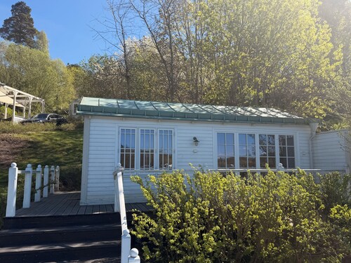 Lake cottage with its own dock and sandy beach