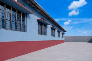 A building with large windows and a flat roof.