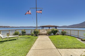 A gazebo with a clear view of the lake and mountains in the background. - Panoramic Views! Clear Lake Cottage w/ Patio (Clearlake)